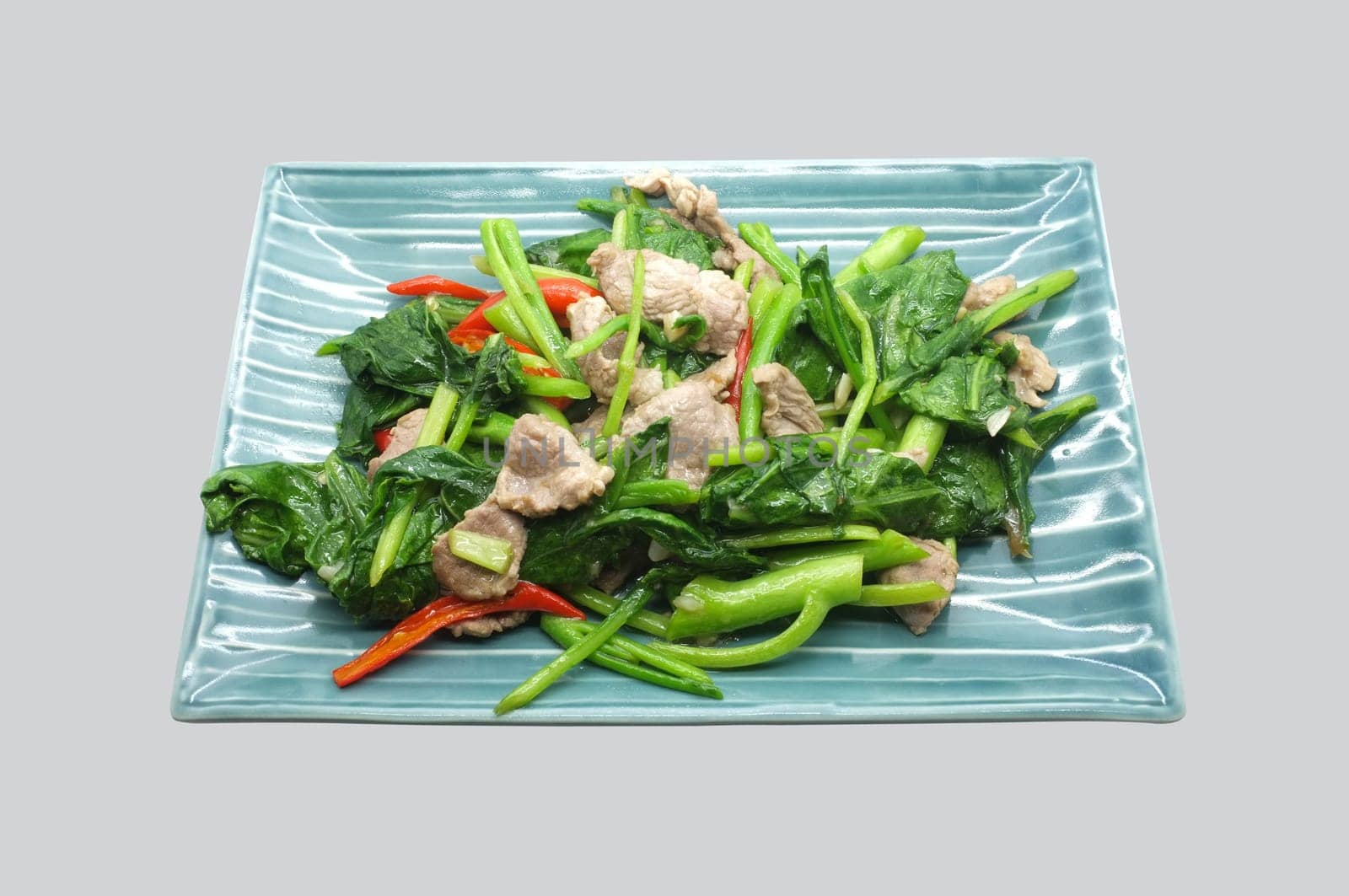 Stir fry chinese kale, cabbage with pork and red chili