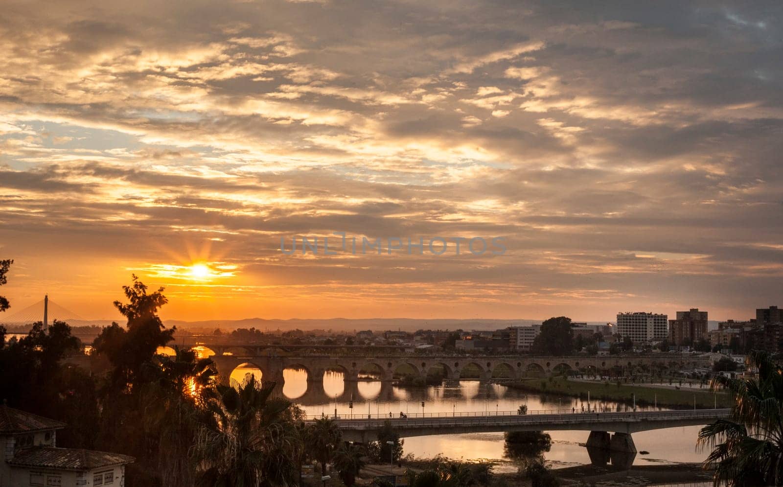 Sunset with Badajoz bridges over Guadiana river