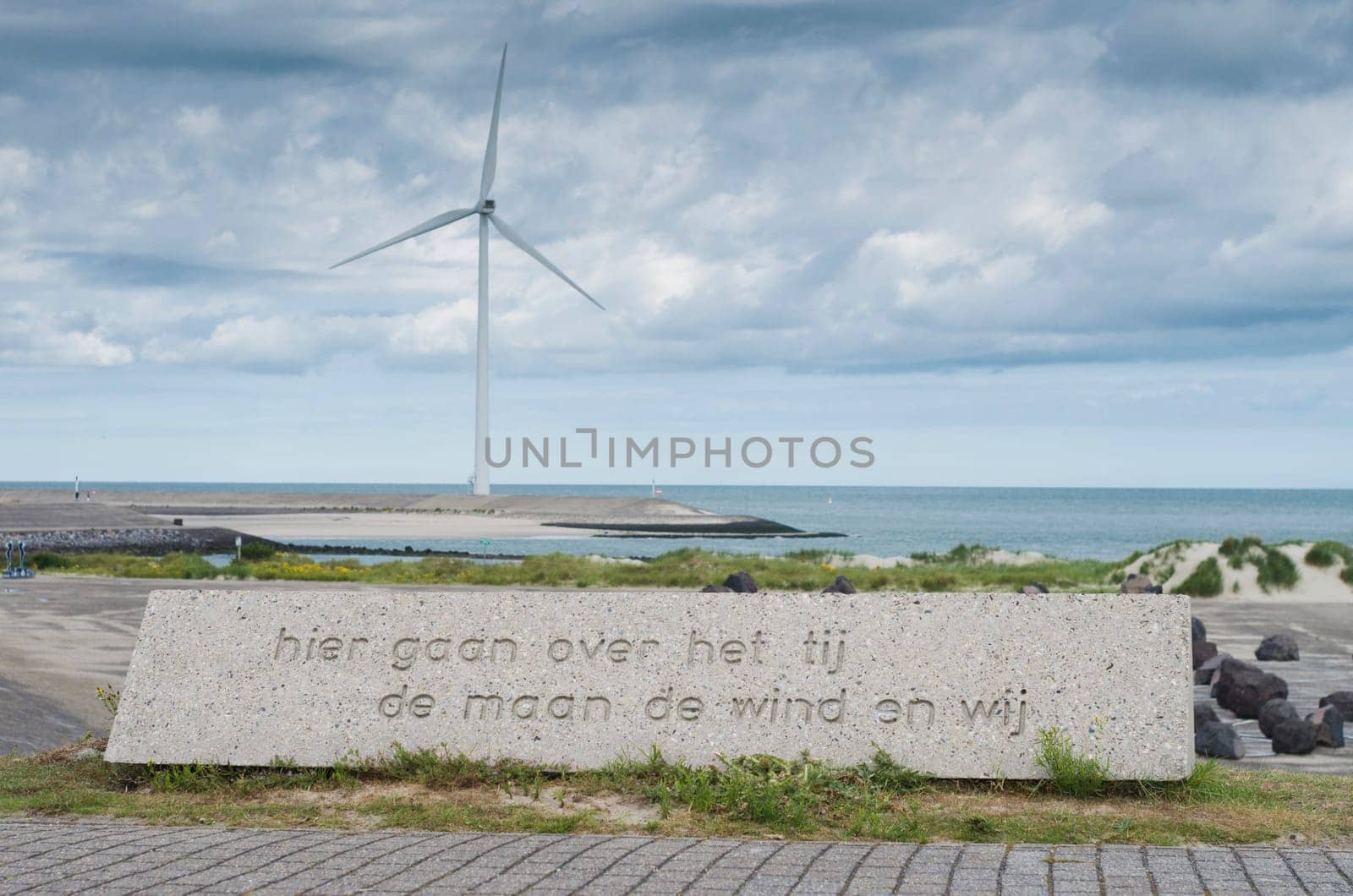 Dutch phrase on a stone on the artificial island Neeltje Jans in Zeeland, Netherlands. It says