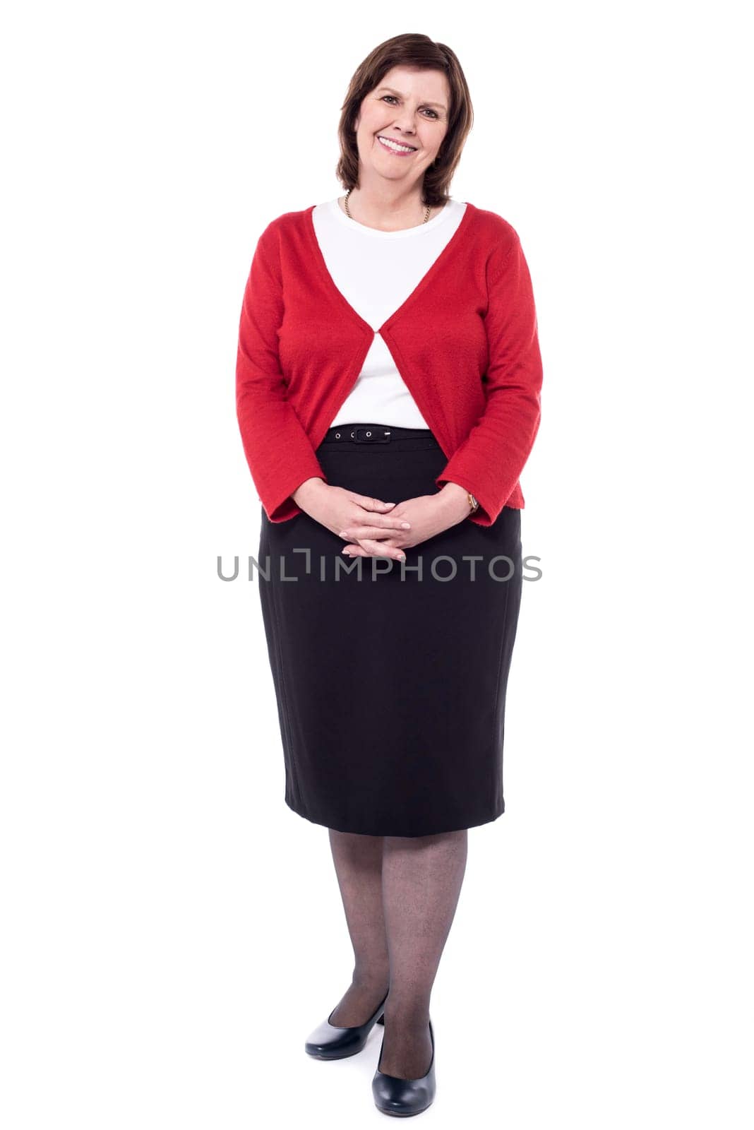 Woman posing with a warm smile over white