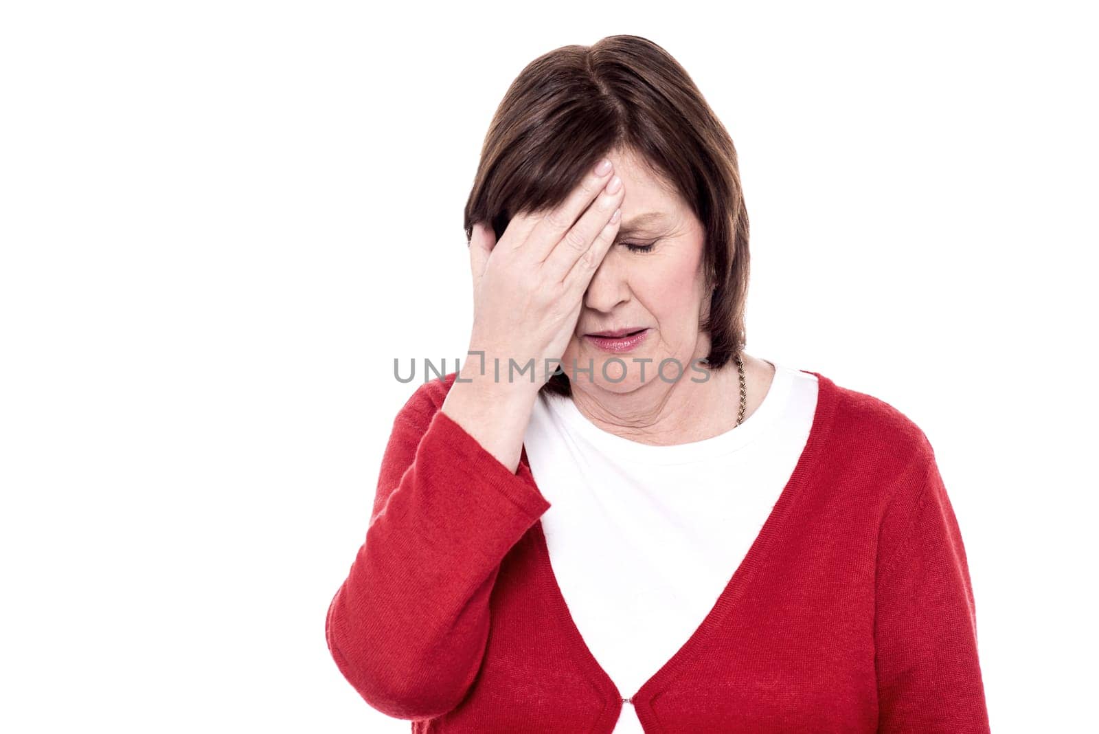 Senior woman stressed with over work load