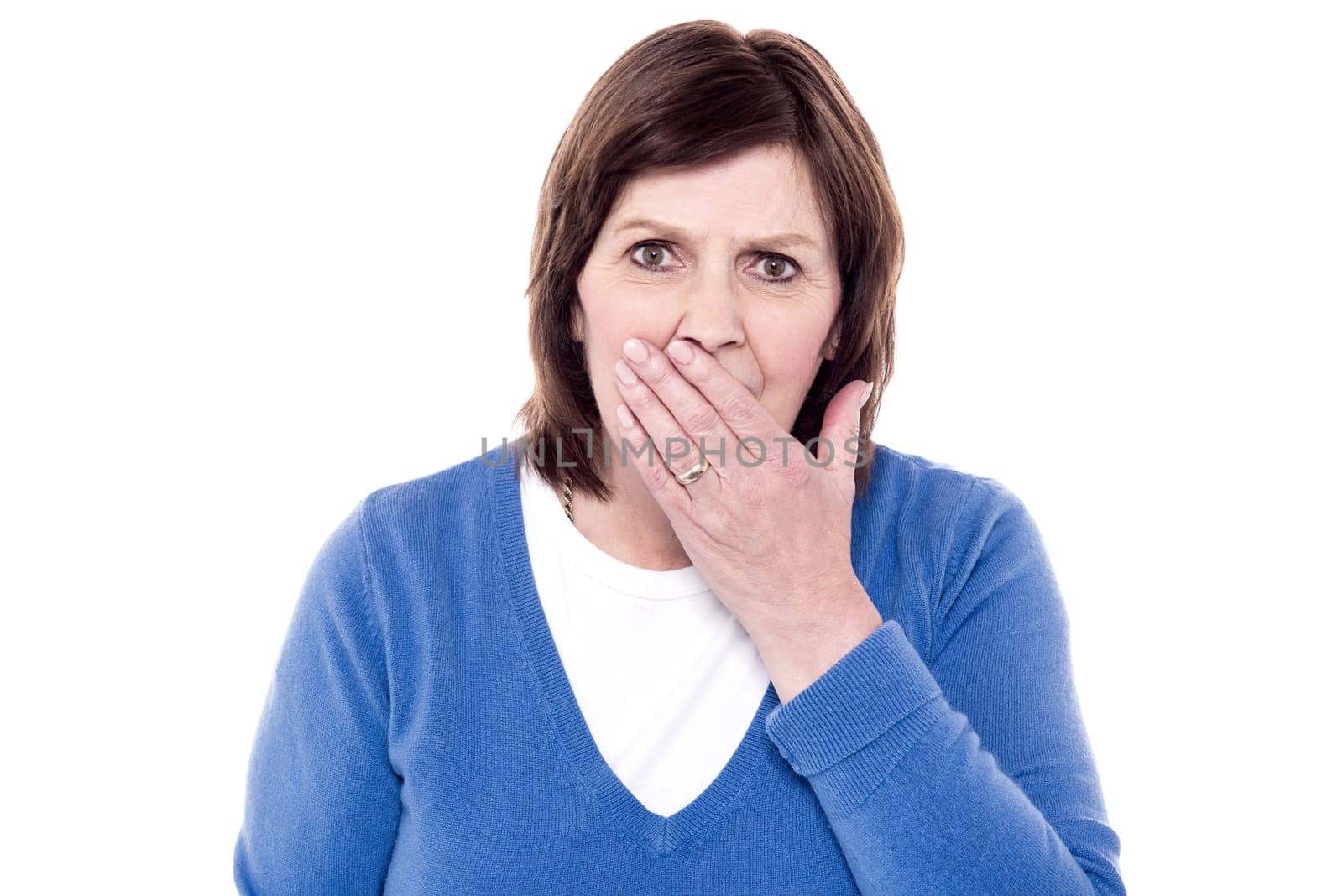 Woman yawning of tiredness and posing to camera