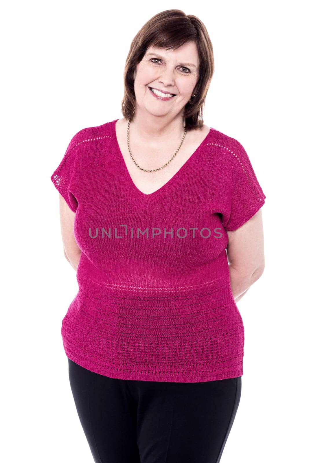 Pretty old woman folded hands at back