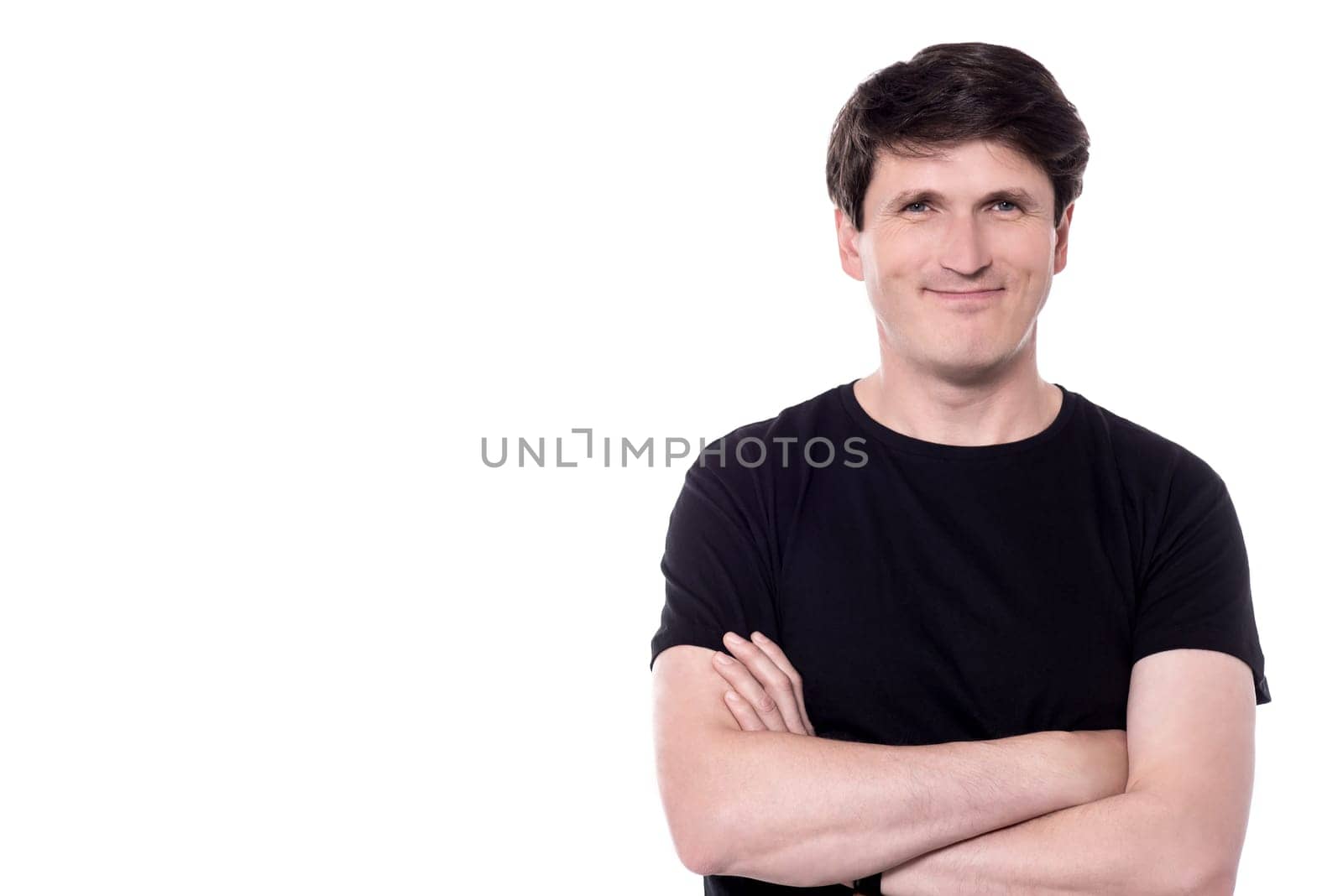 Handsome guy with folded arms over white