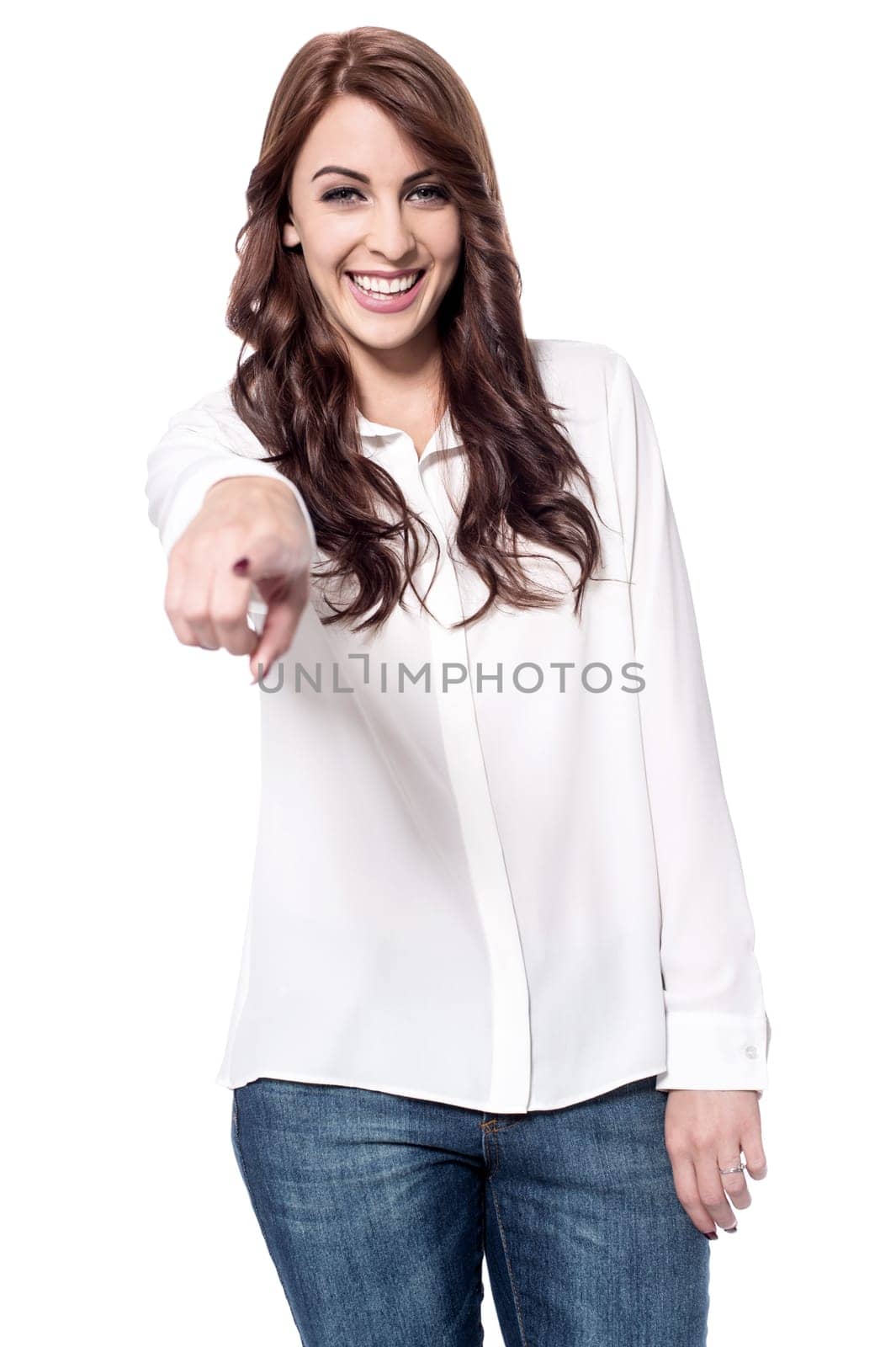 Happy young lady pointing at you