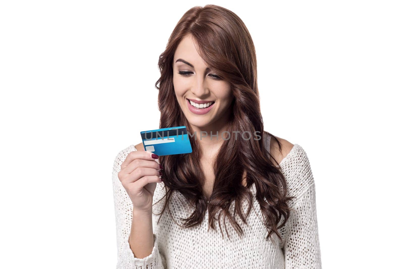 Beautiful lady reading her credit card numbers