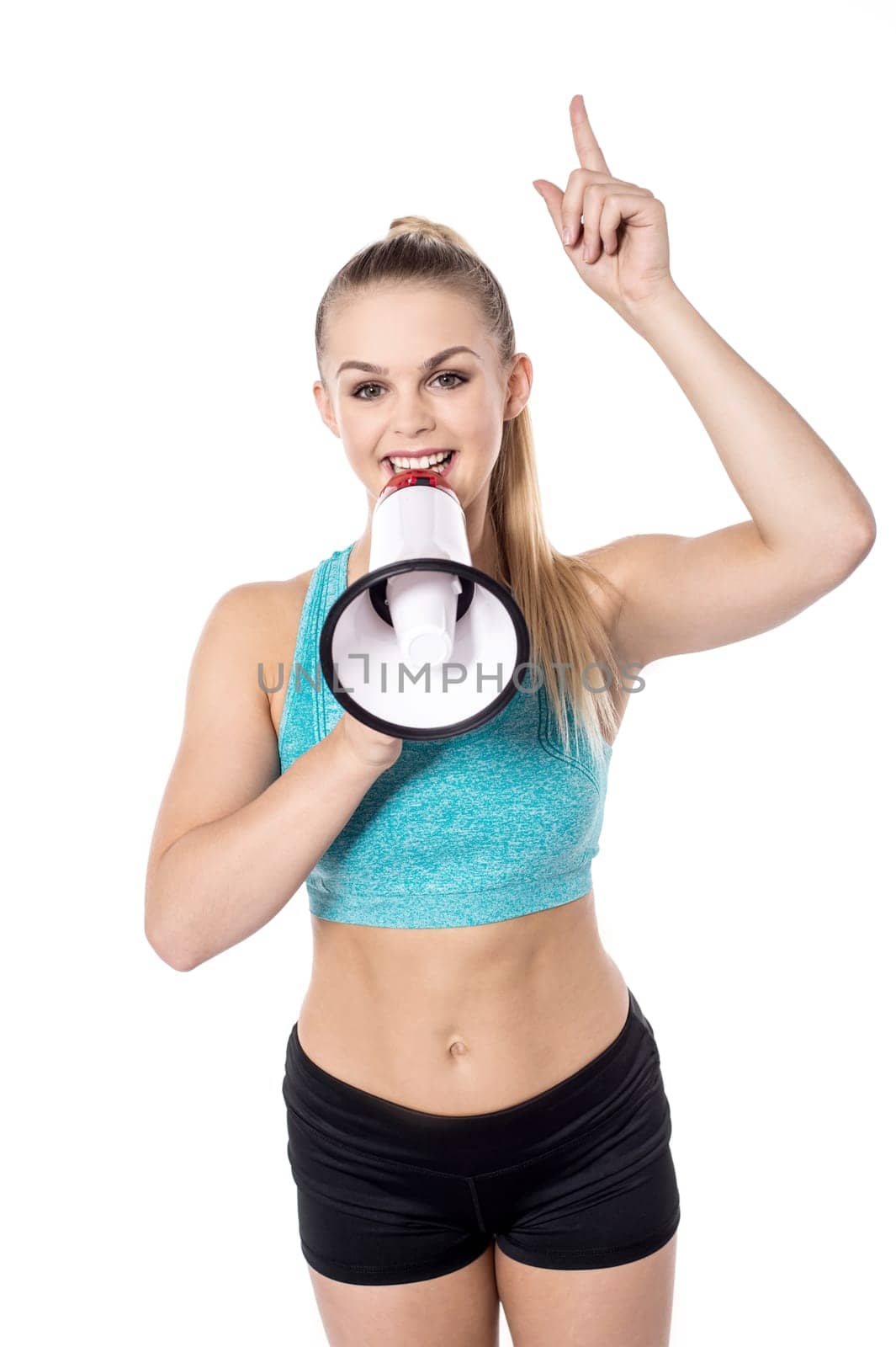 Pretty trainer speaking through megaphone