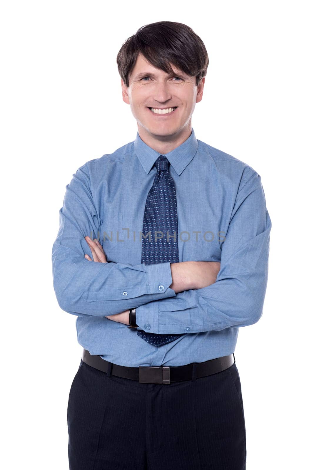 Businessman posing with bright smile over white