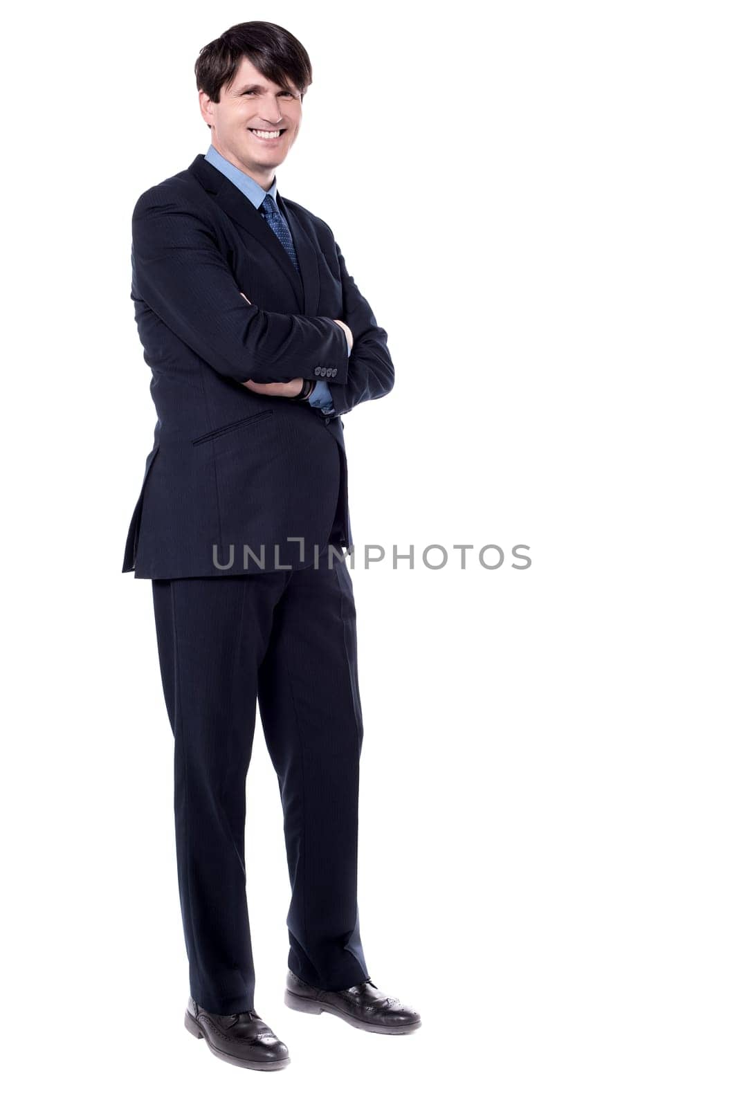 Side shot of a confident businessman over white