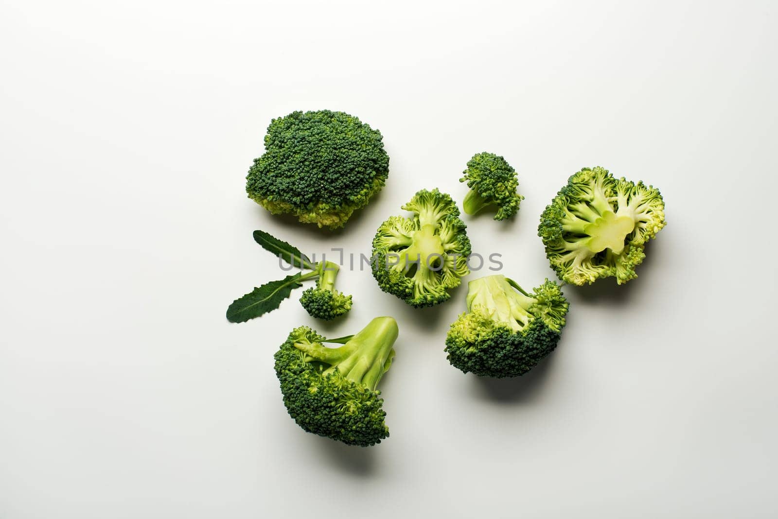 Fresh raw broccoli isolated on a white background.