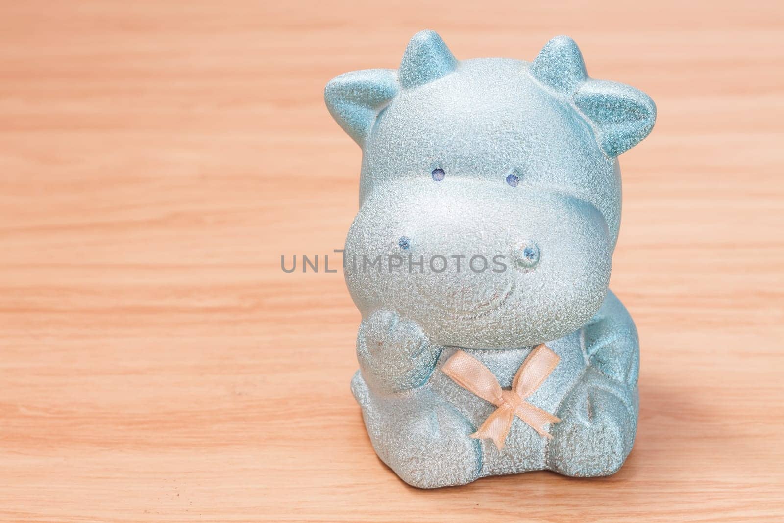 Green cow doll saving box, stock photo