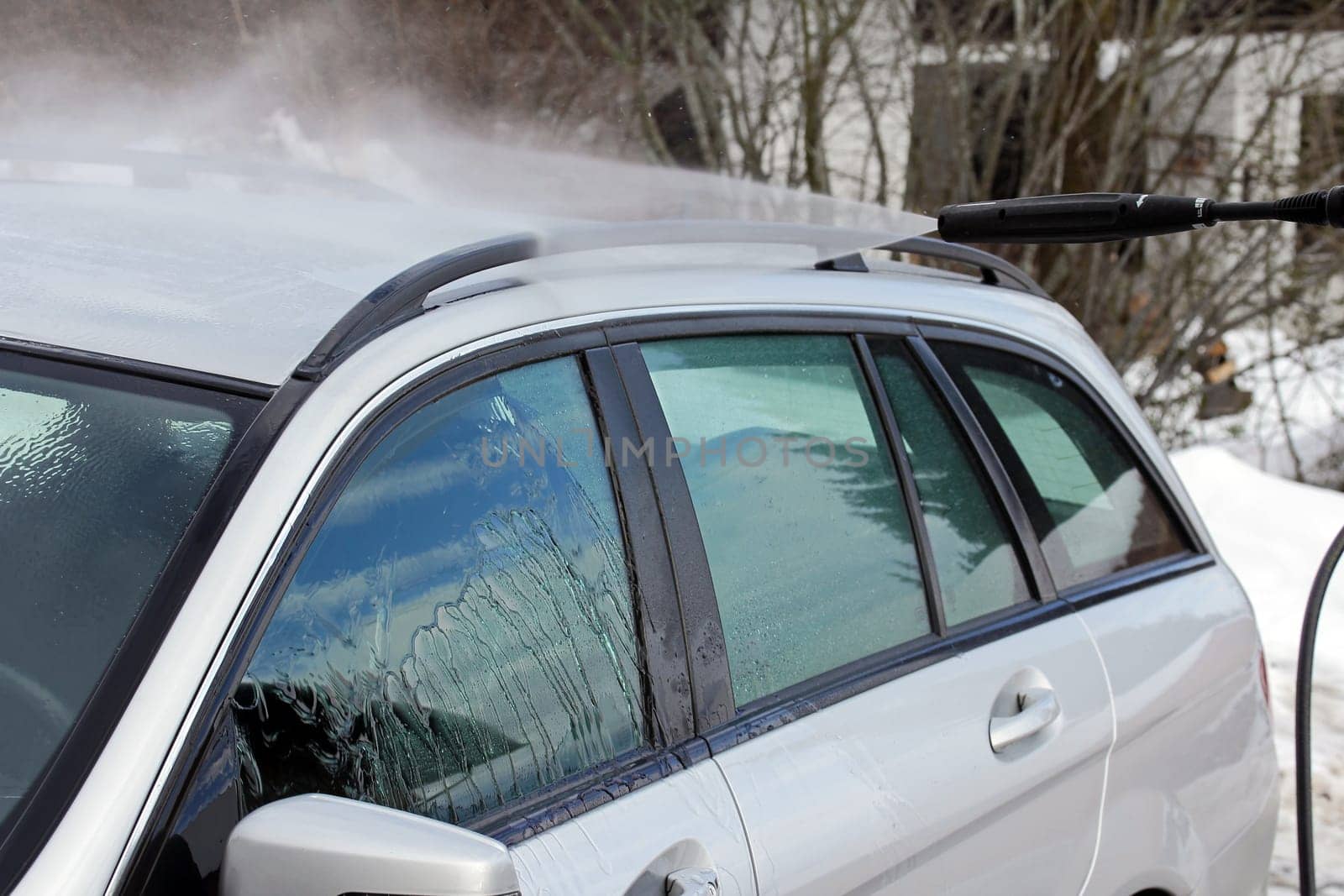 Car wash in winter - rinsing of salt and dirt