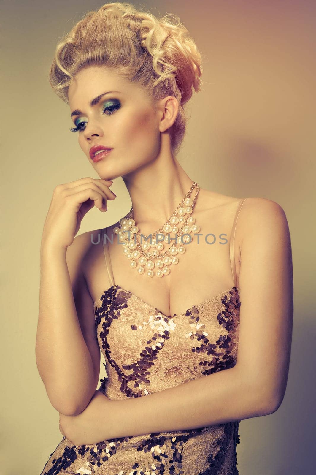 attractive blonde woman in evening dress