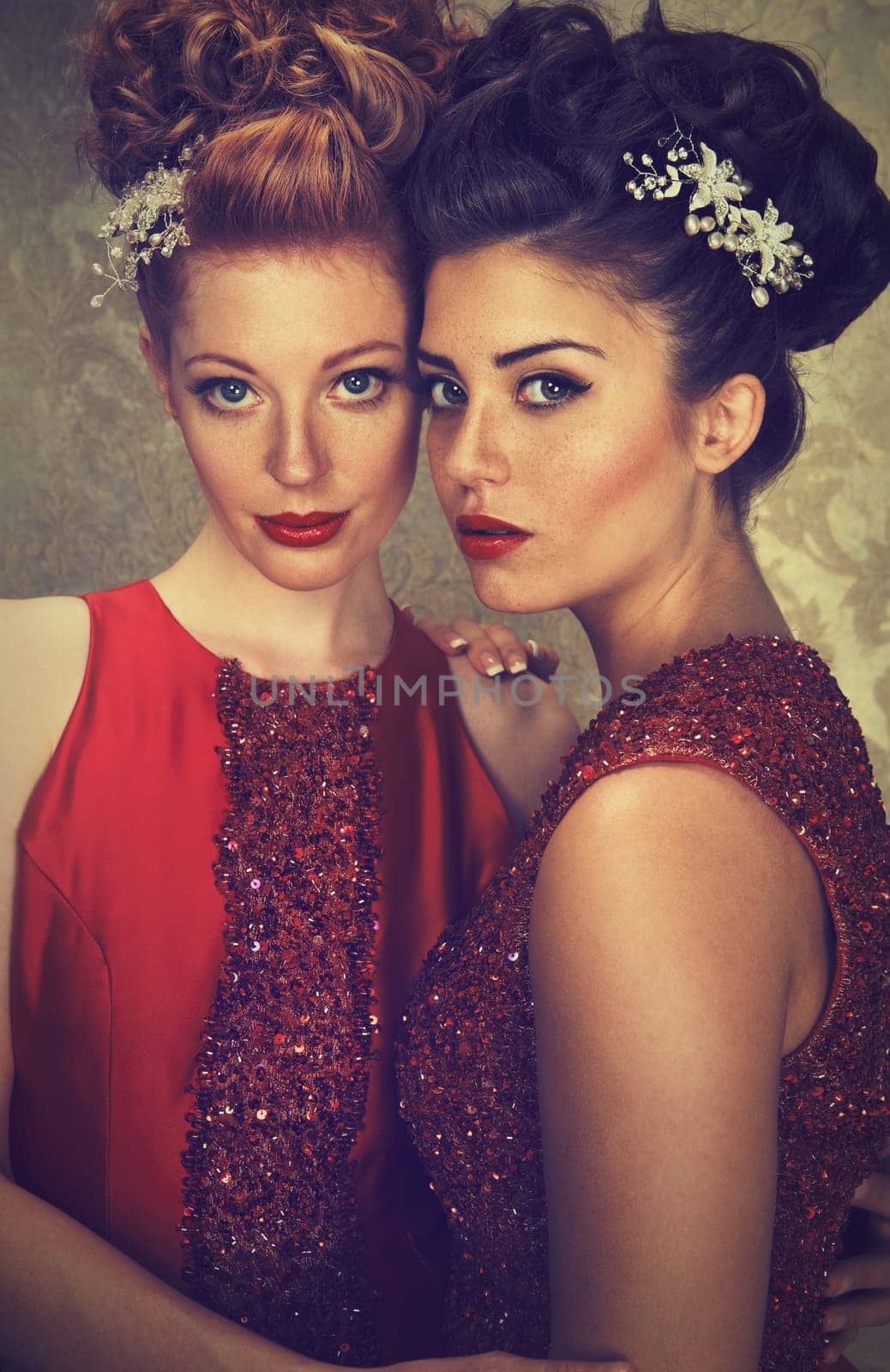Two attractive women in elegant outfit