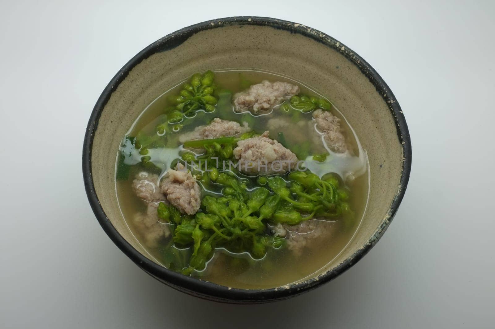 Vegetable soup with cowslip creeper and minced pork