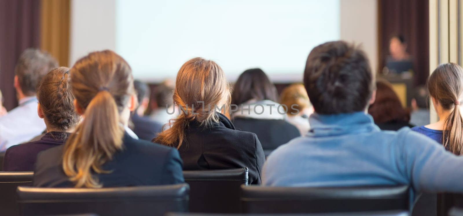 Speaker Giving a Talk at Business Meeting. Audience in the conference hall. Business and Entrepreneurship.