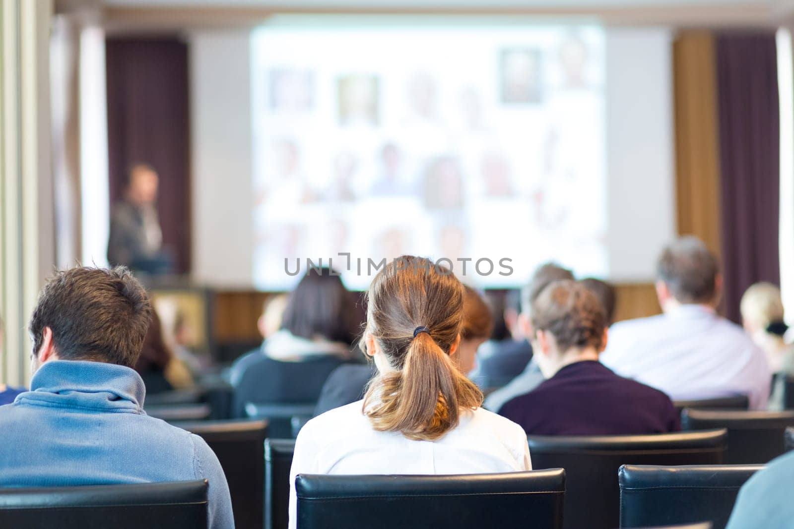 Speaker Giving a Talk at Business Meeting. Audience in the conference hall. Business and Entrepreneurship.