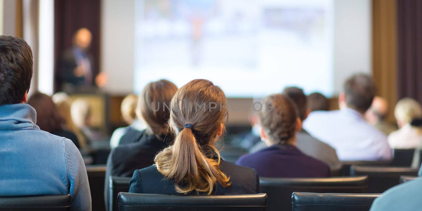 Speaker Giving a Talk at Business Meeting. Audience in the conference hall. Business and Entrepreneurship.
