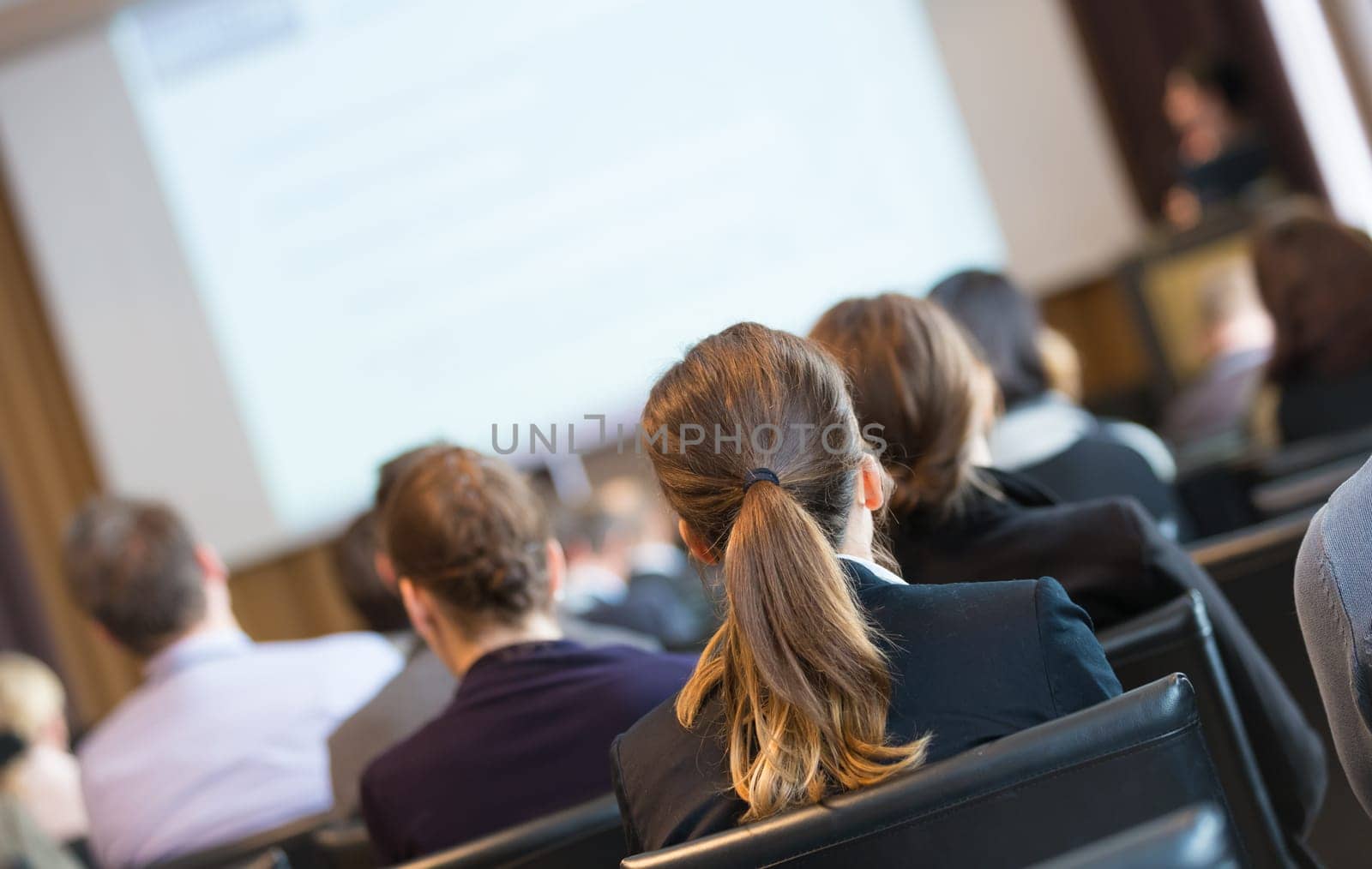Speaker Giving a Talk at Business Meeting. Audience in the conference hall. Business and Entrepreneurship.