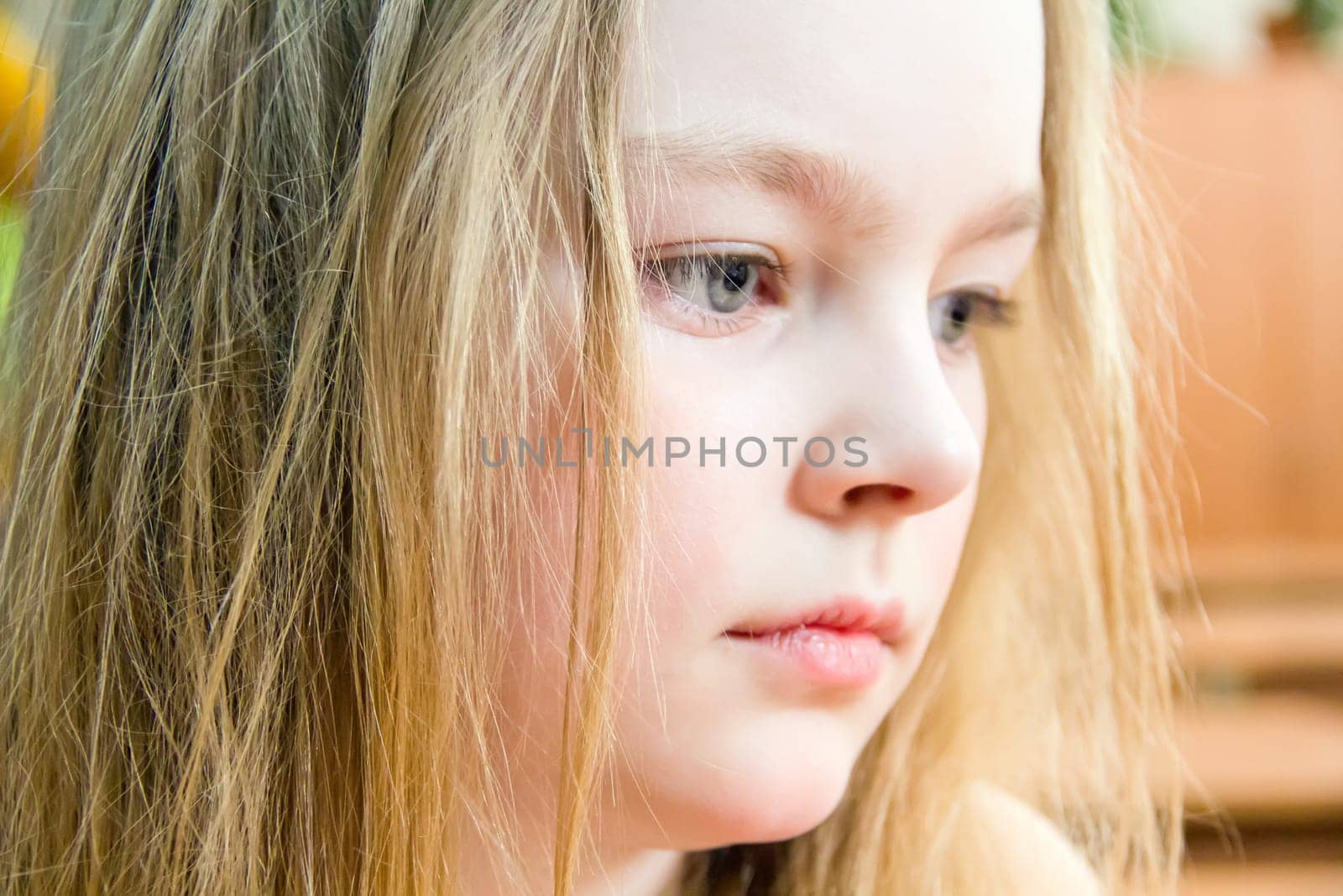 Profile of cute girl with blond hair