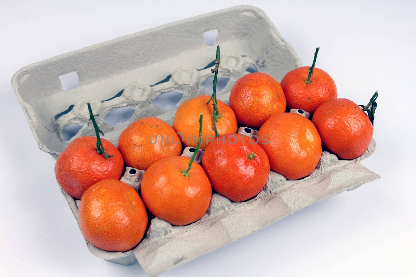 Mandarins in an egg carton