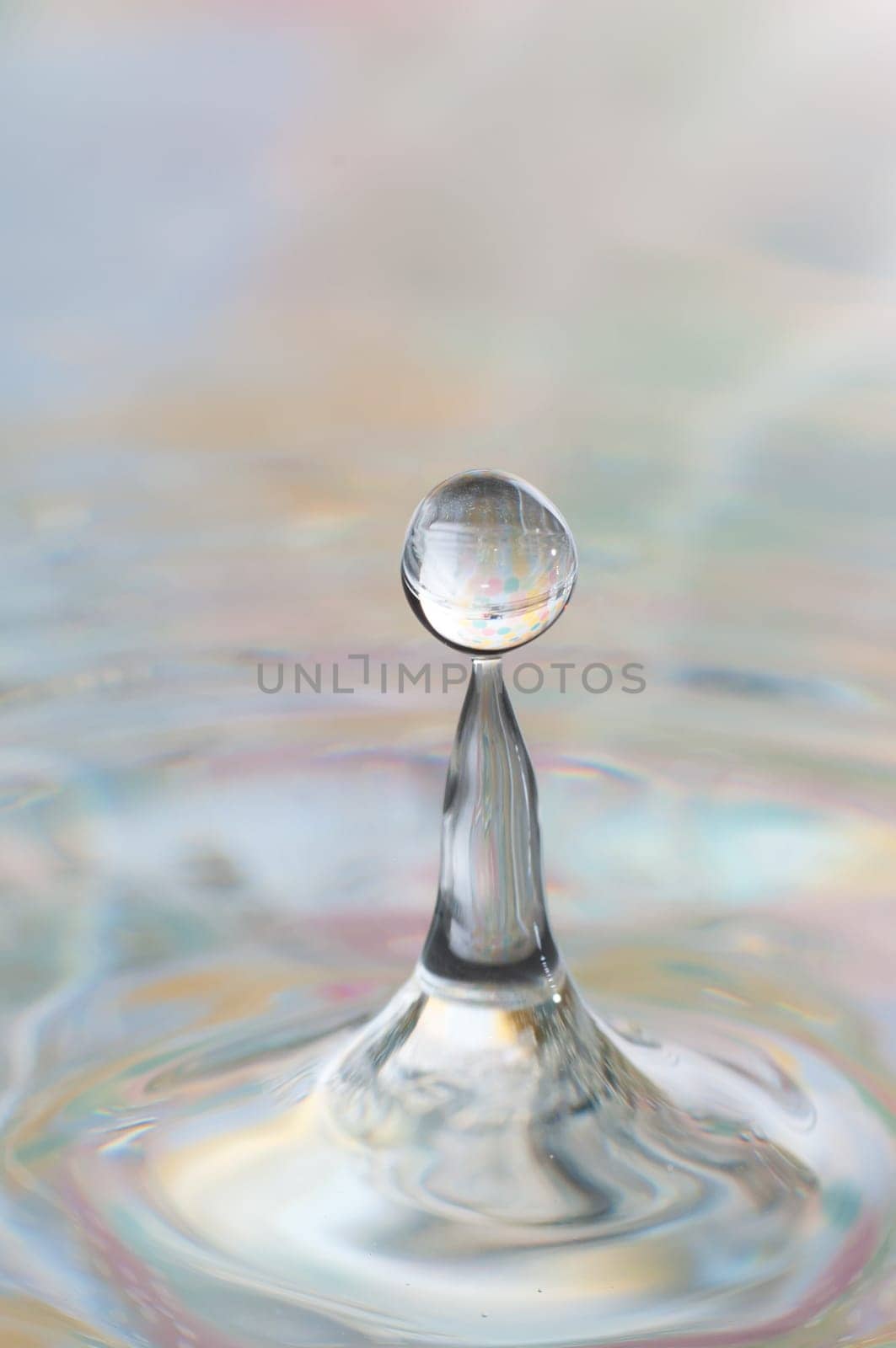 Multicolored water droplet captured with high speed lights