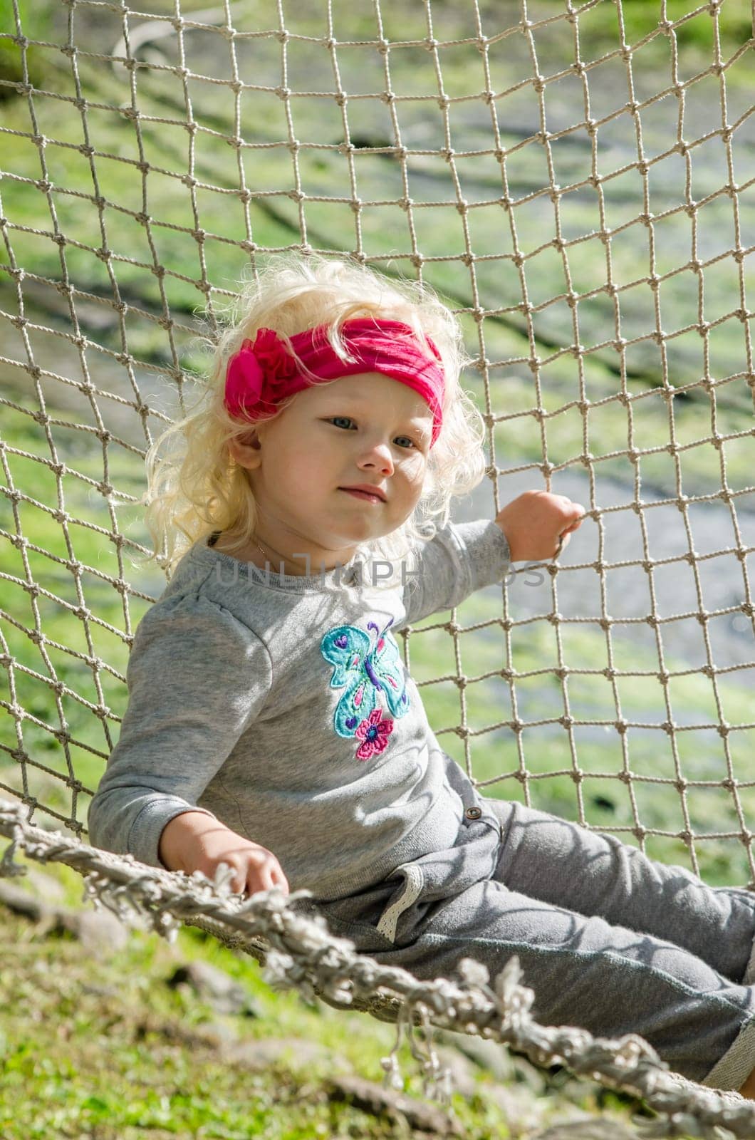 Girl swinging in a hammock