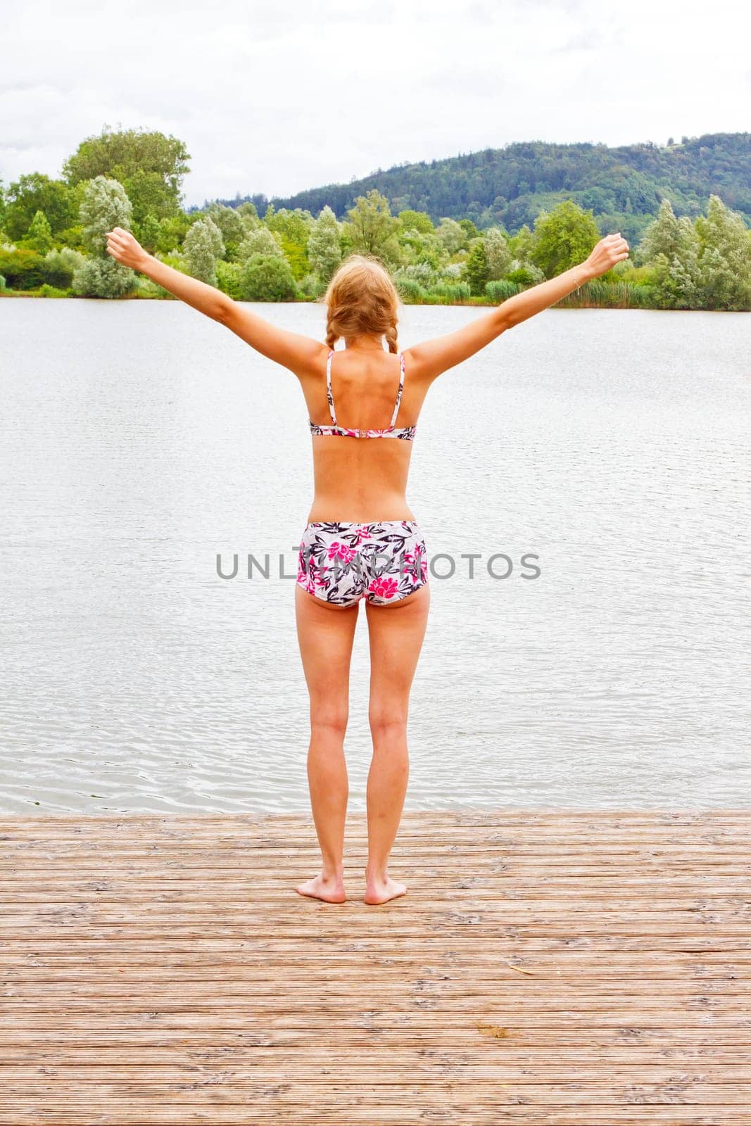 Young woman at the bathing lake