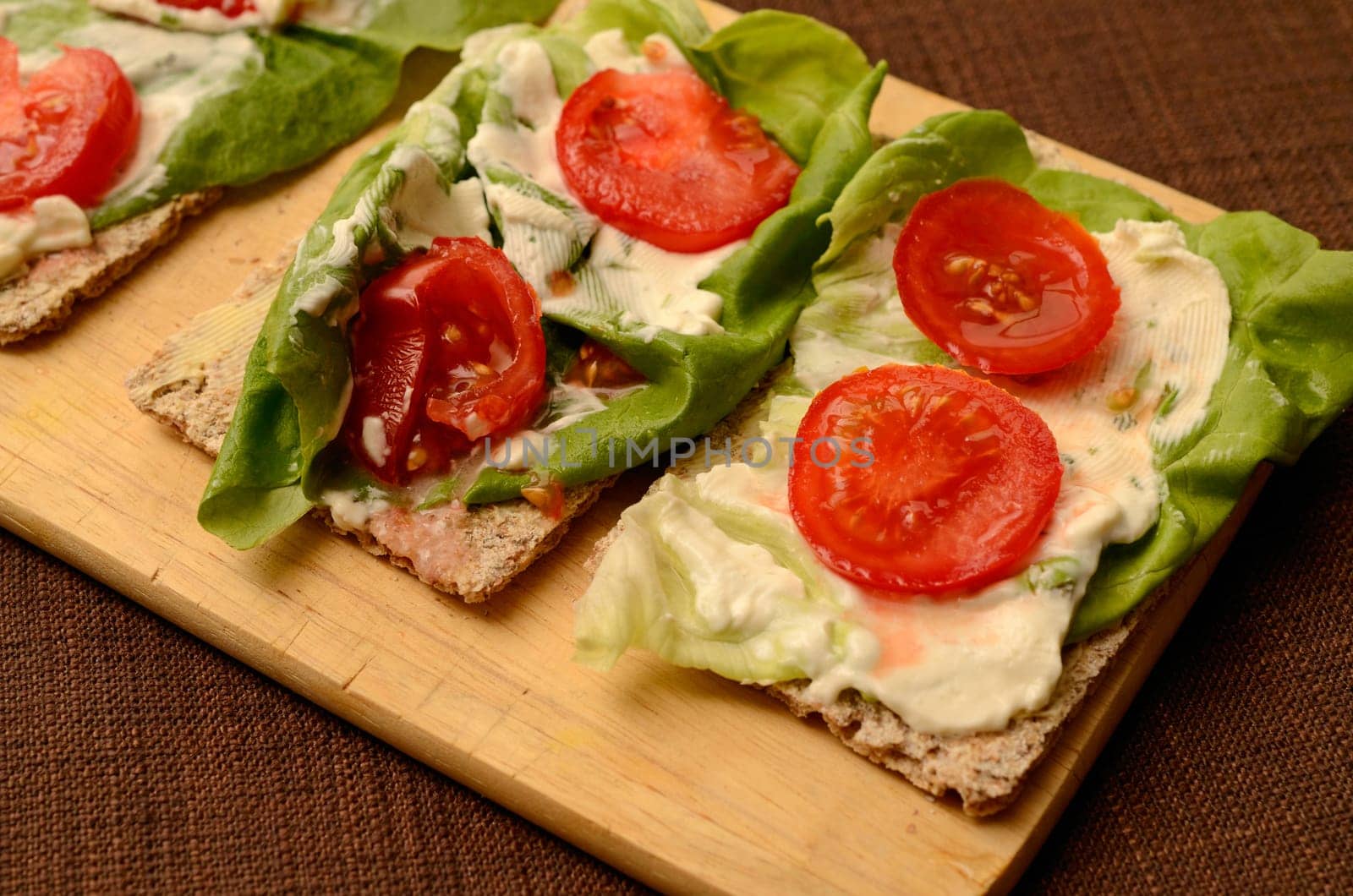 Whole grain bread with salad and cheese