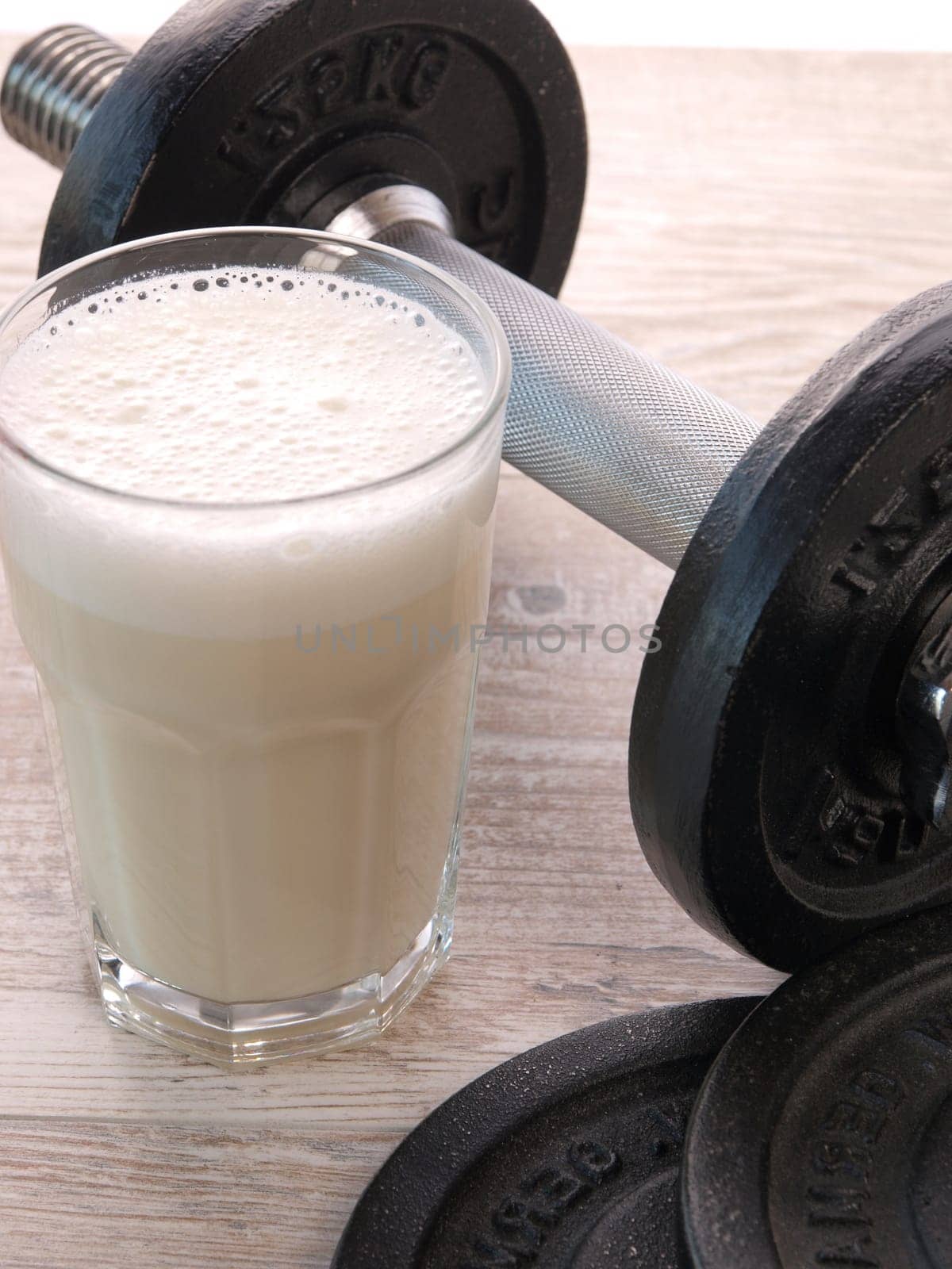 Fitness shake with dumbbells