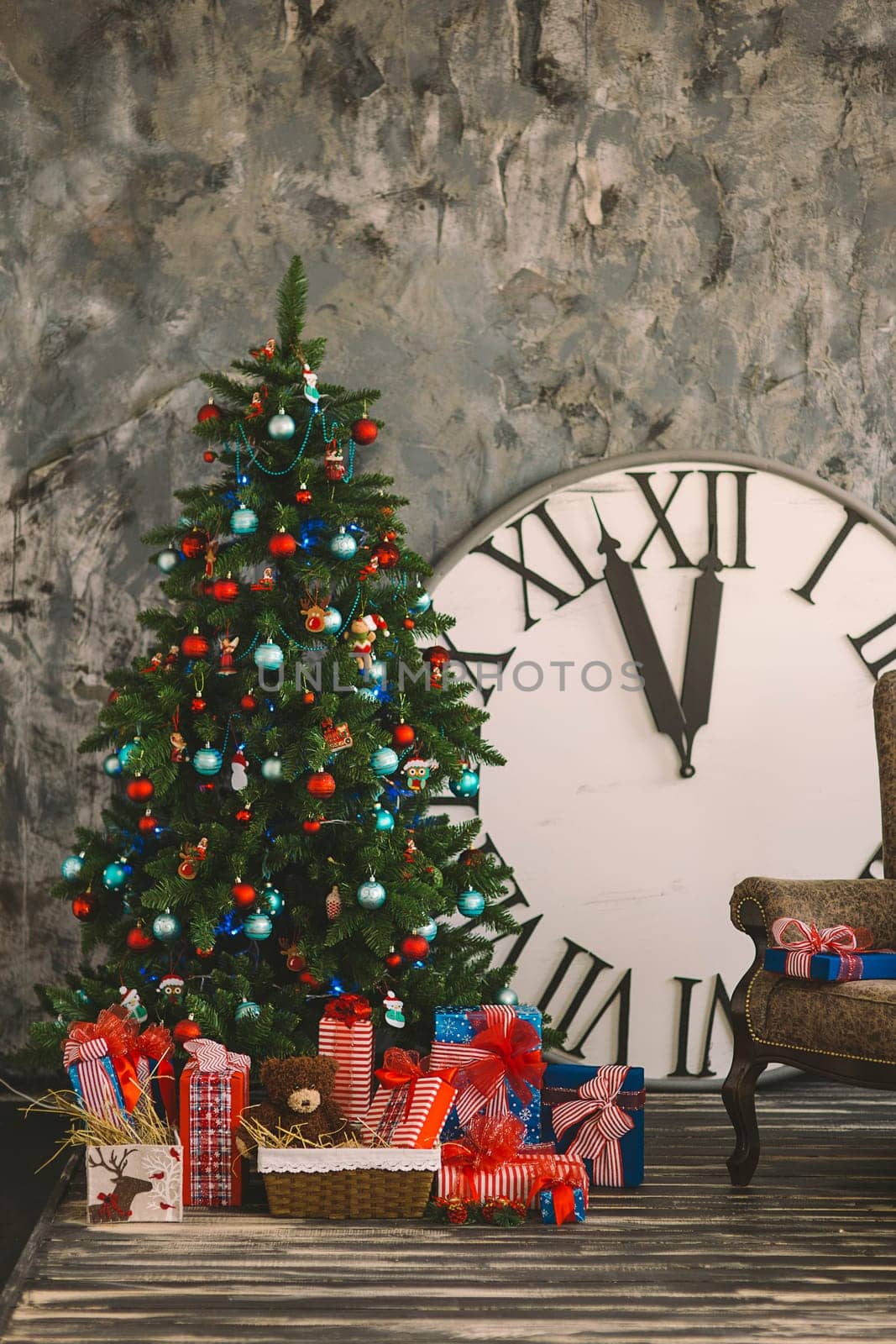 New Year's and Christmas interior with hours, gifts, with a chair, in red, blue, blue colours