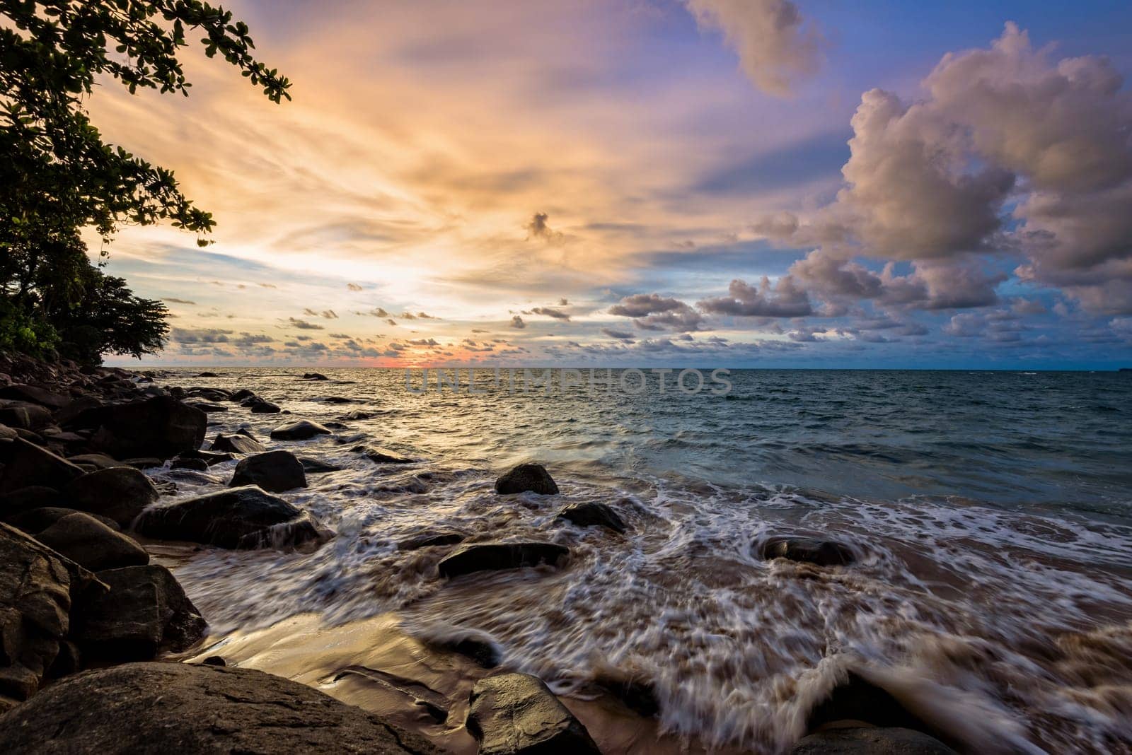 Beautiful landscape of sky and clouds above the sea during sunset at Khao Lak Beach in Khao Lak-Lam Ru National Park, Takuapa, Phang Nga province, Thailand