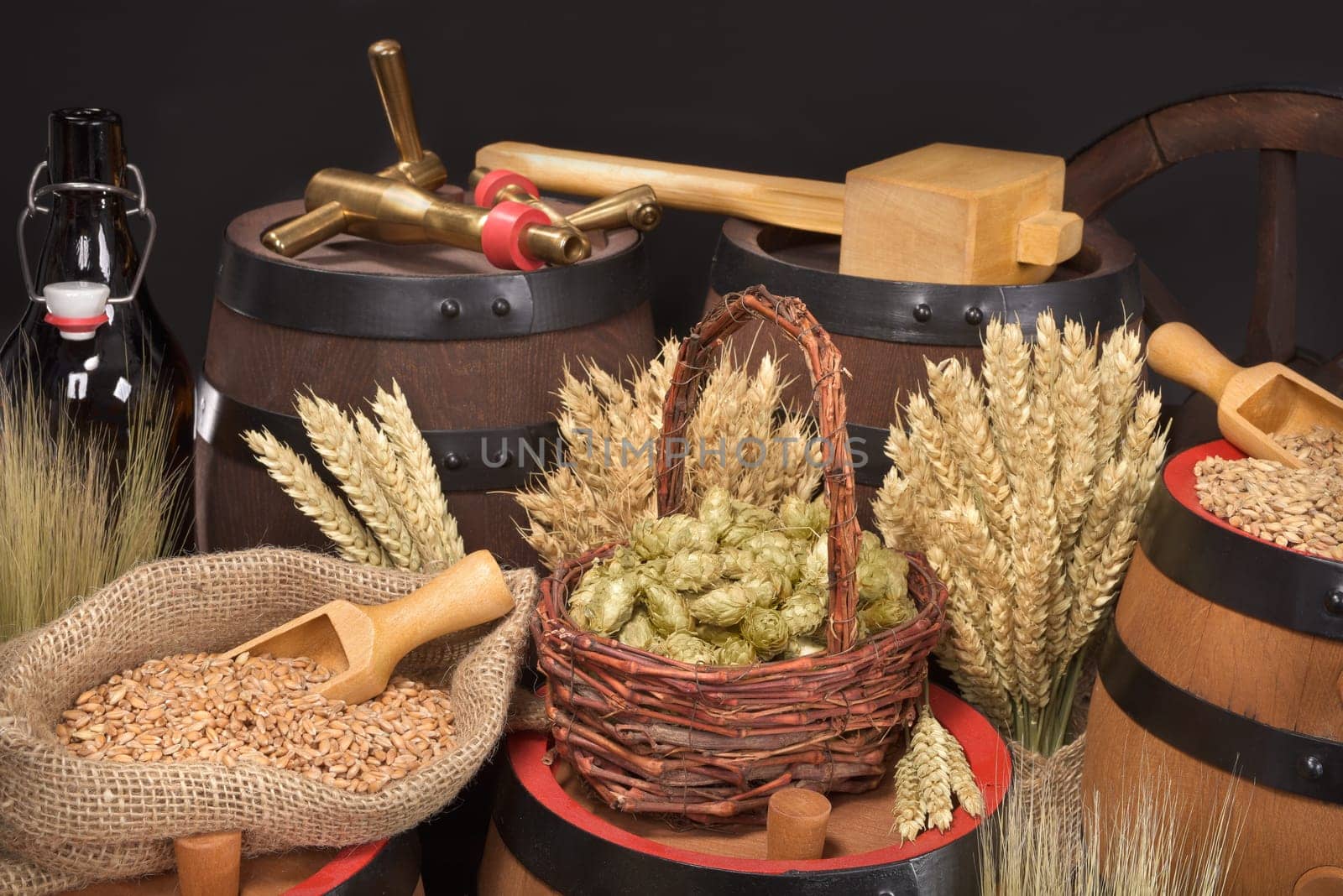 Beer barrels,beer bottle,hammer and tap with wheat,barley,hops and malt