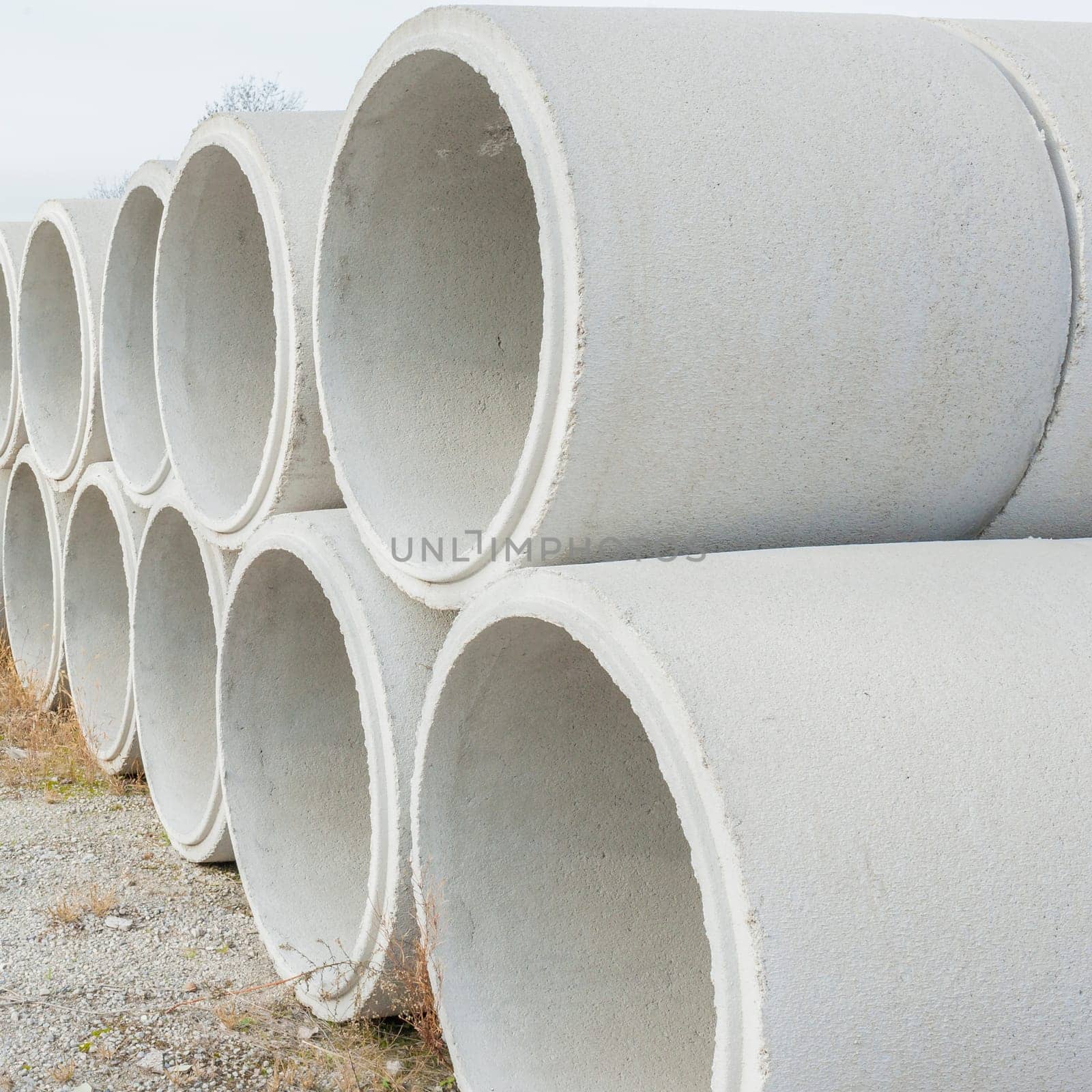 Concrete drainage pipes for industrial building construction.
