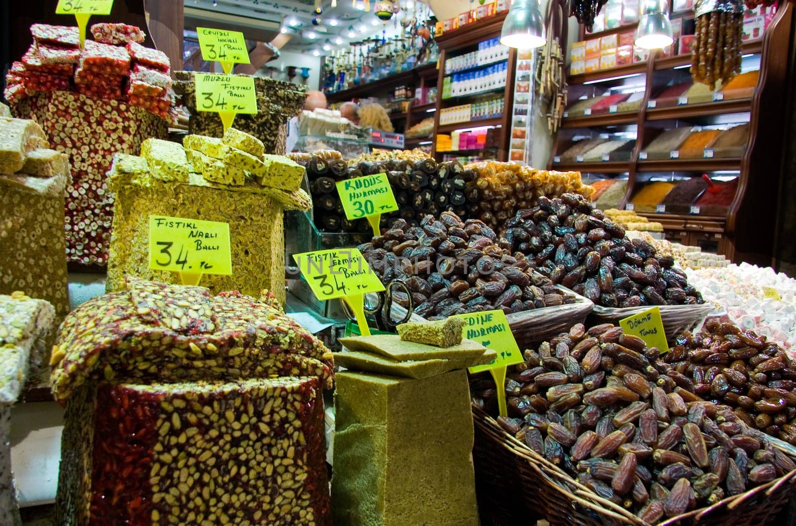 Showing of Turkish sweets, dried fruits and nuts in a stall in the Istanbul spice market