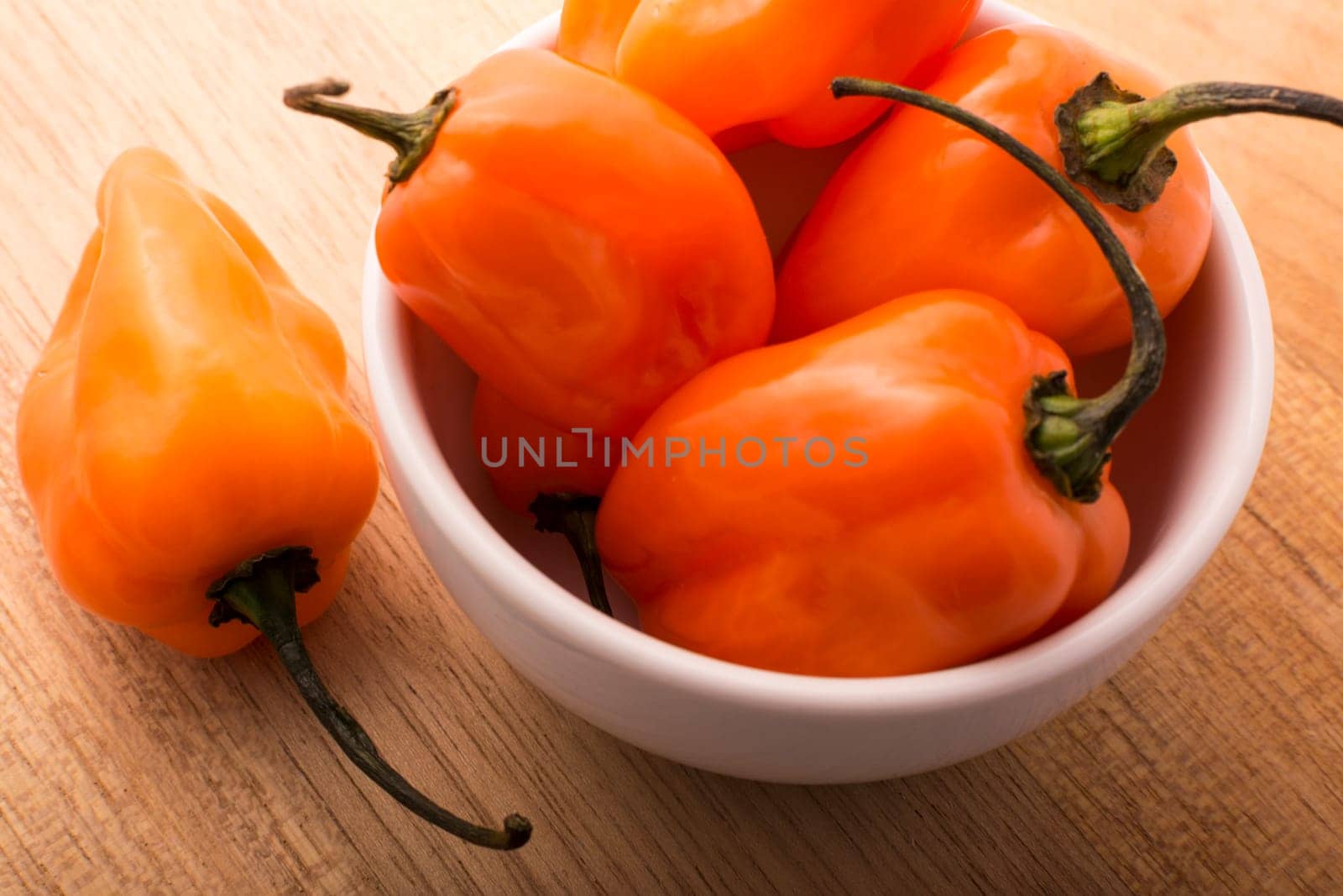 Approach and details a set of chiles habaneros. Typical of mérida, yucatán. is a pepper very spicy and powerful taste.