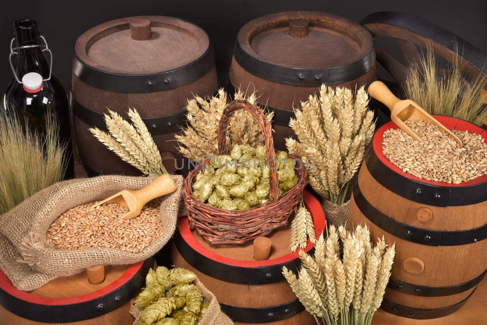 Beer barrels,beer bottle,hammer and tap with wheat,barley,hops and malt