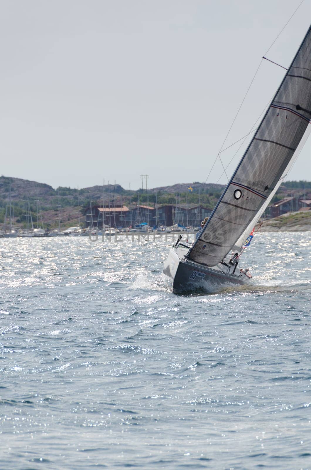 one sail competition on swedish westcoast one lonely boat