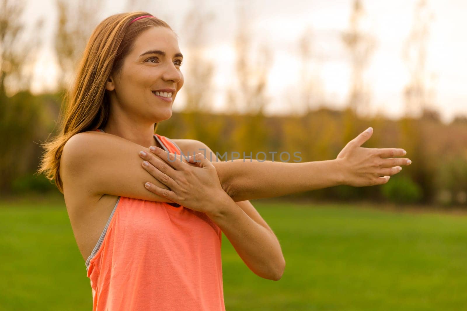 Beautiful woman stretching after finish the exercise