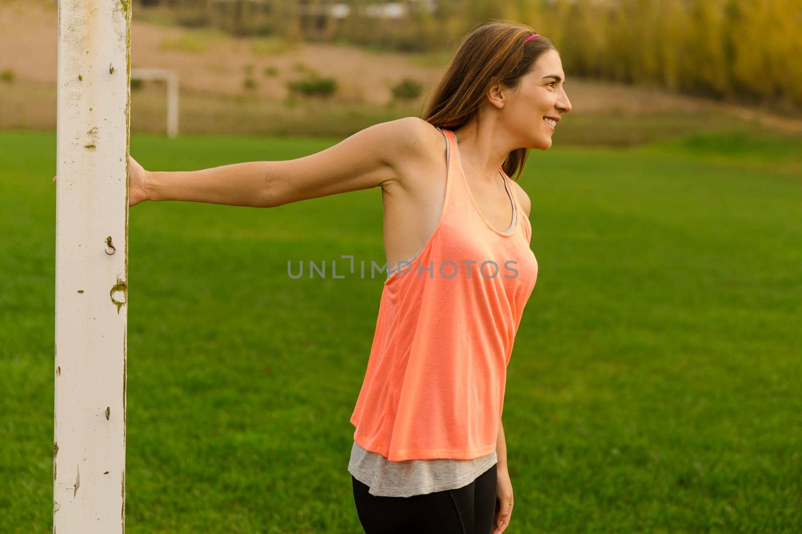 Beautiful woman stretching after finish the exercise