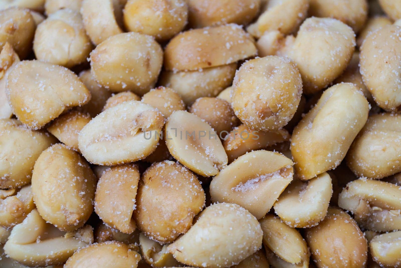 pile of roasted peanuts in a bowl