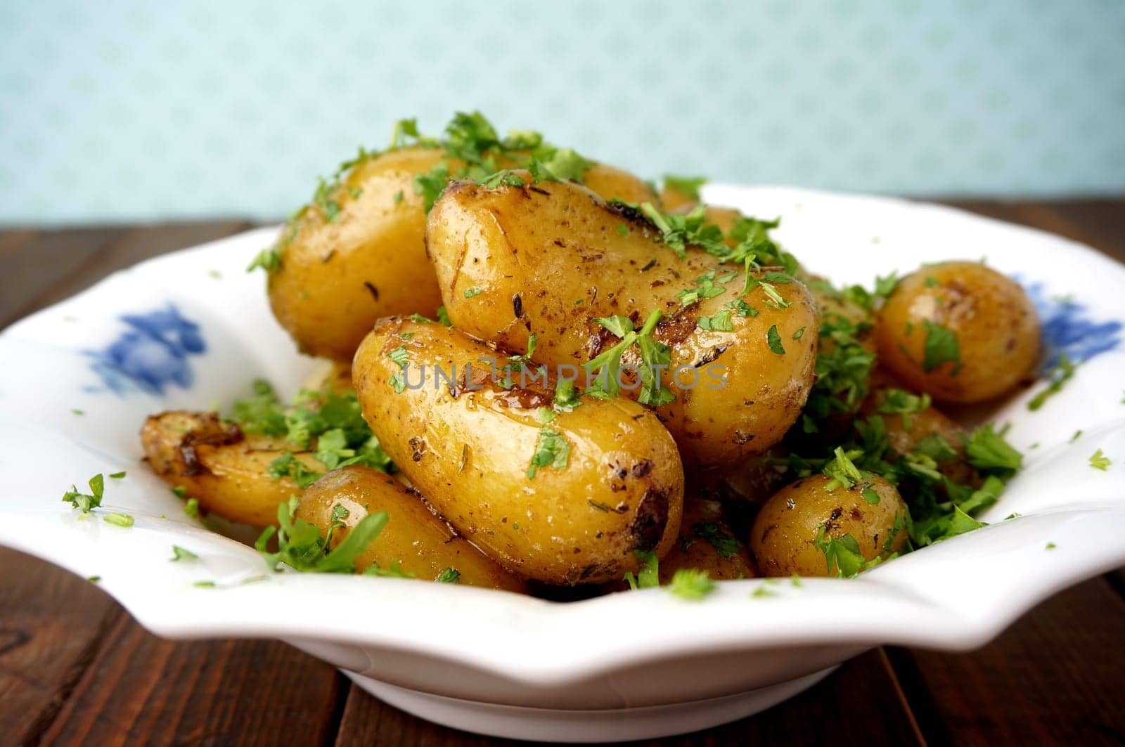 Roasted potatoes. Healthy sidedish with parsley garnish