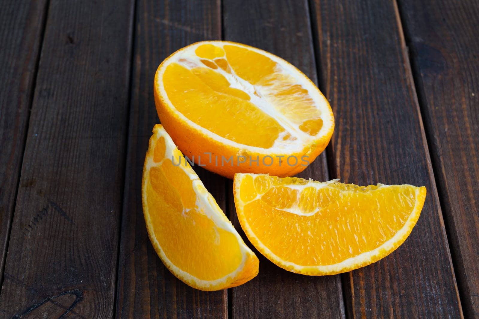 Fresh jucy orange in half and slices