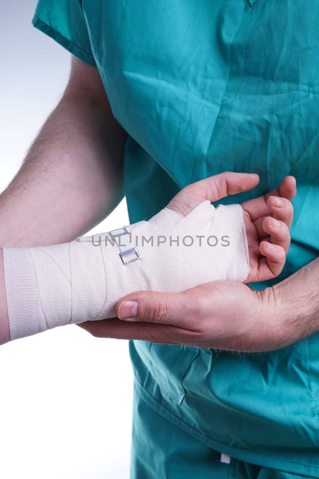Sprained hand, Doctor helping with the Bandage