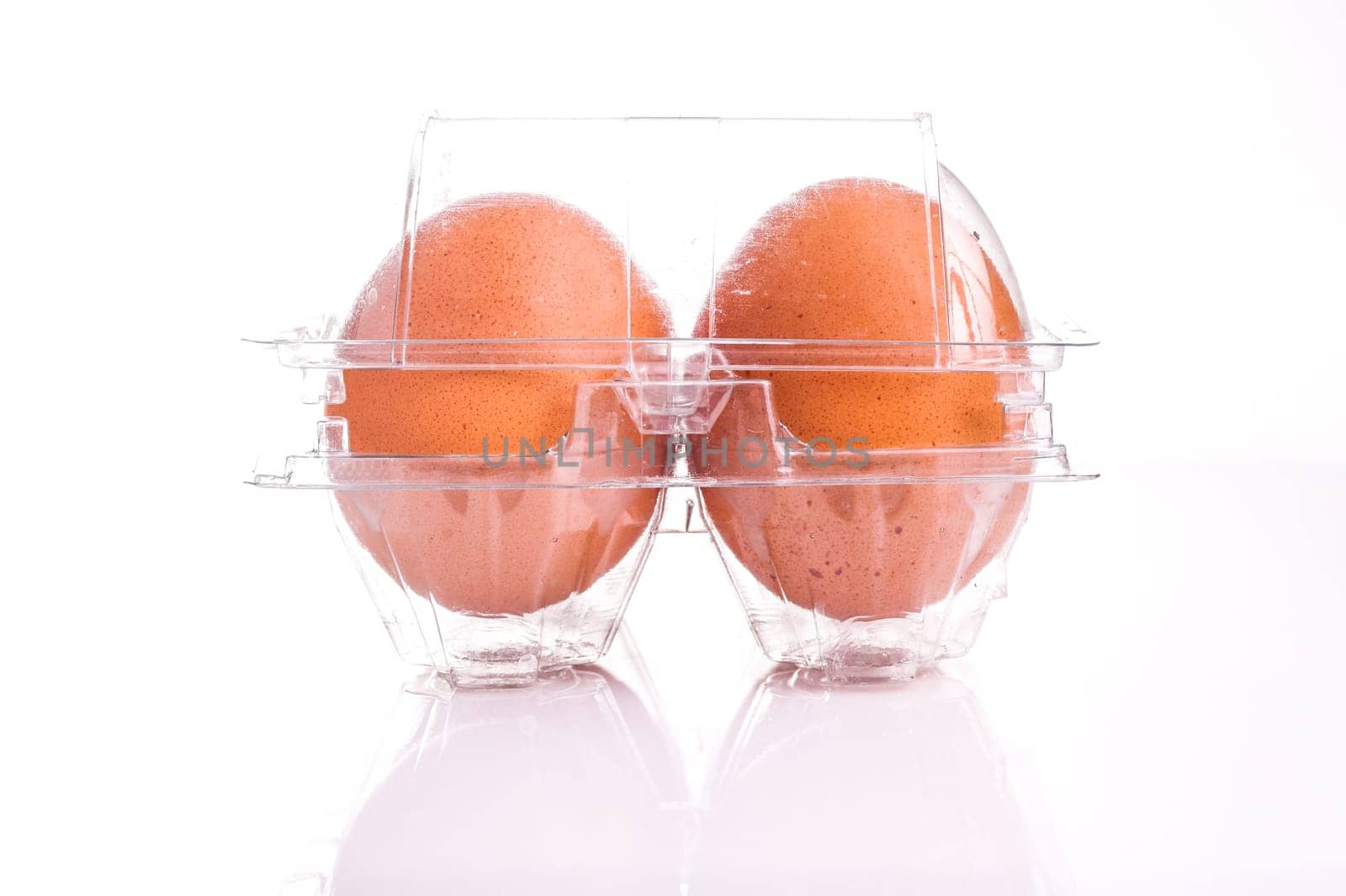Egg tray with four egg isolated on white