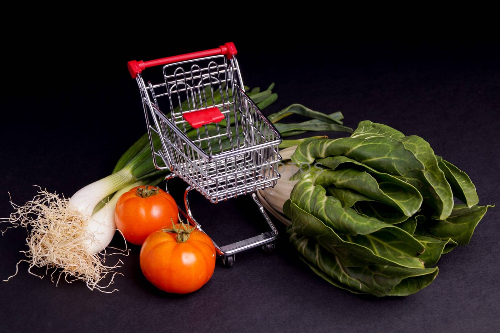 Chopping Cart with vegetable isolated on Black