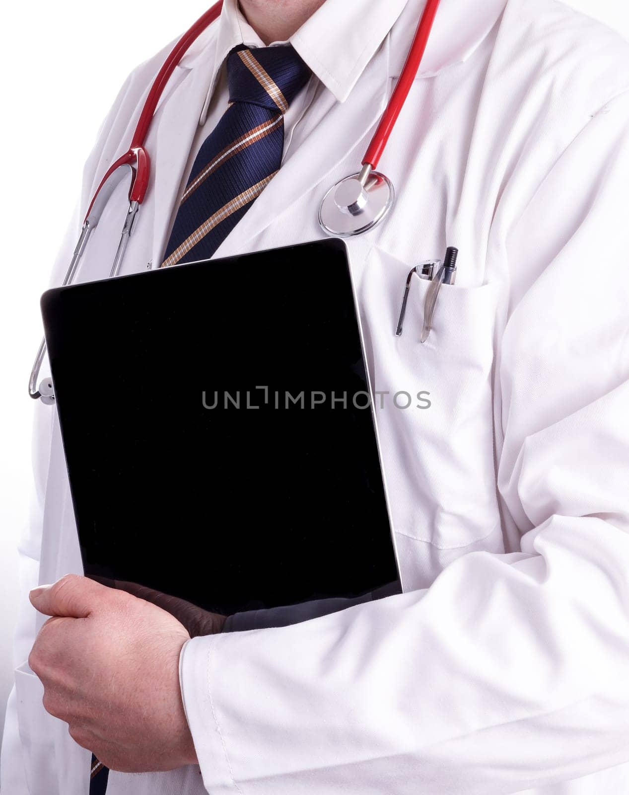 Male doctor is using a digital tablet in his work. The Digital Hospital, with new and modern resources and easy access to the important information about the patients, test results and patient registration