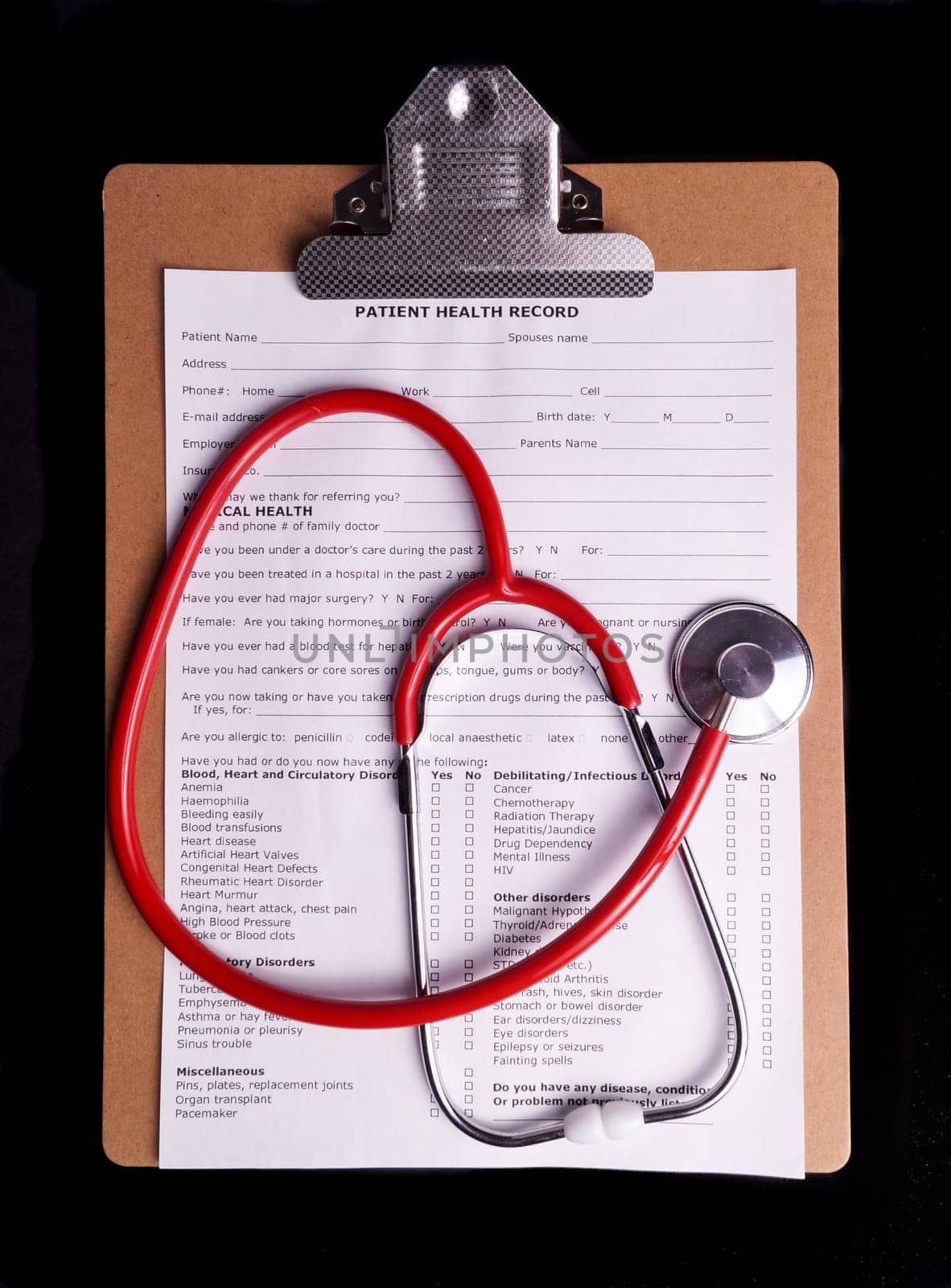 Medical Chart and stethoscope isolated on black background