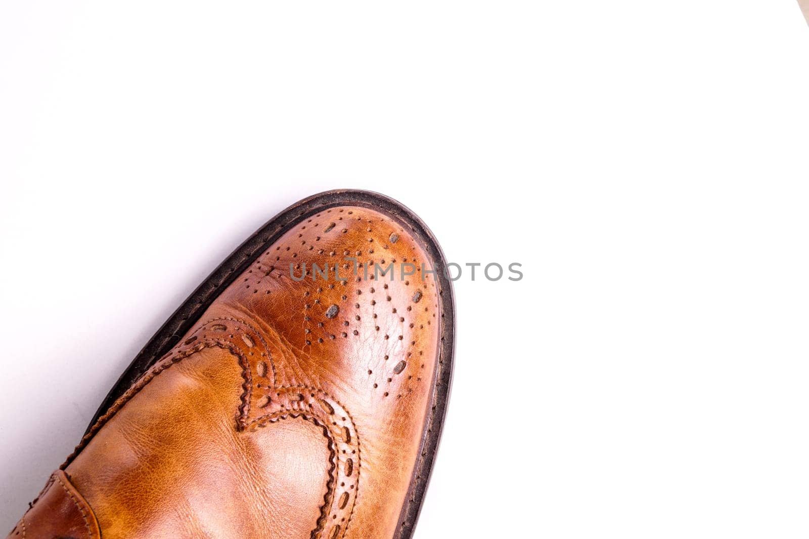 Elegant gentleman Leather Shoe. Brown elegant men's shoes ready to use for a gentleman rendezvous or business meeting. Isolated on white