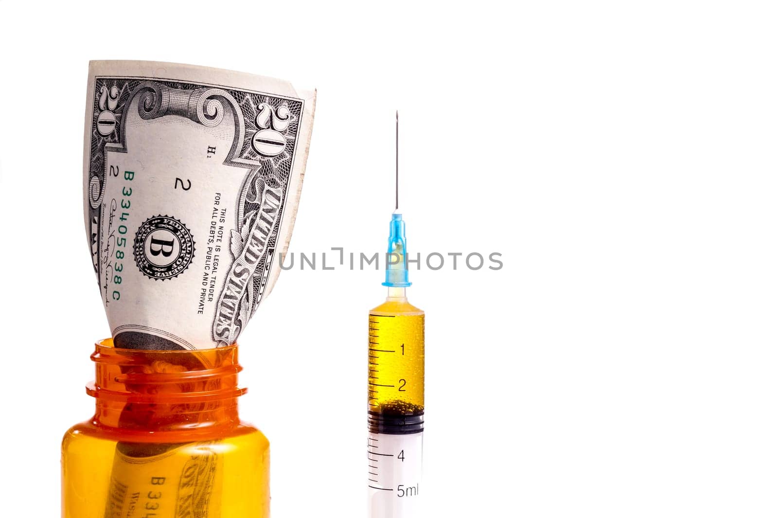 Money in a prescription Medicin Bottle. Both Prescription and Drugs cost a lot of money